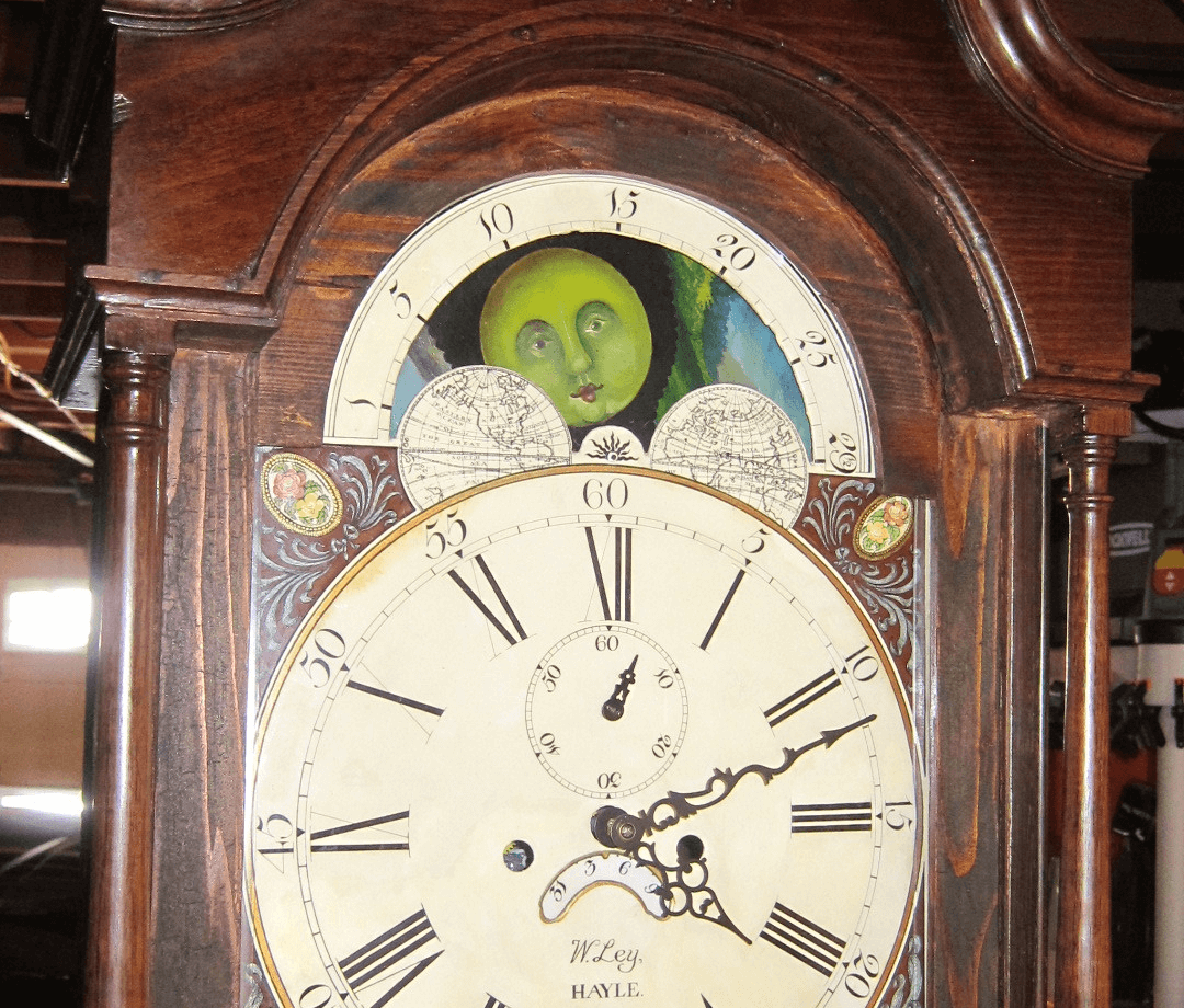 Antique grandfather clock retrofitted with Arduino control