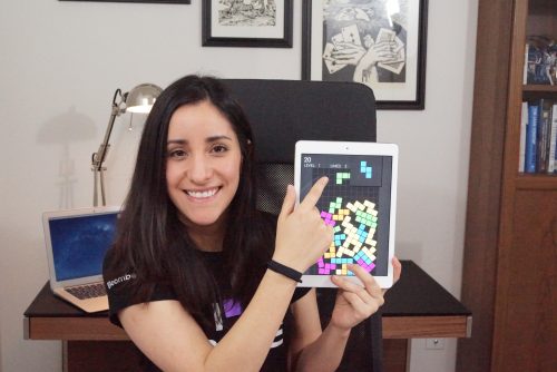 A woman showing off a game on a tablet — Estefannie Explains it All Raspberry Pi