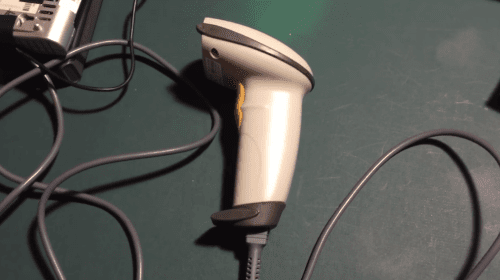 A screenshot from the video showing the laser scanner used for the Raspberry Pi-powered barcode reader