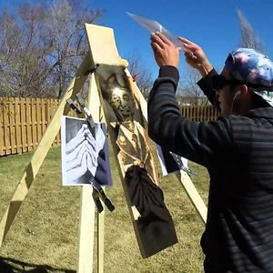 Man Uses Sunlight To Burn Image Of Fallen Soldier Onto A Piece Of Wood