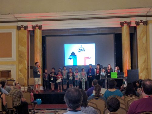 Kids on a stage at PyCon UK