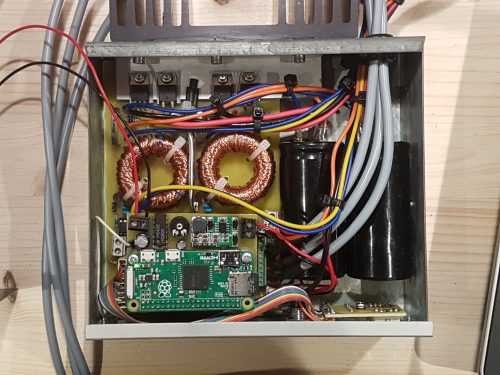 A photo of the inside of Alan’s beer cooler complete with Raspberry Pi and a heap of wiring (as described in the paragraph below)