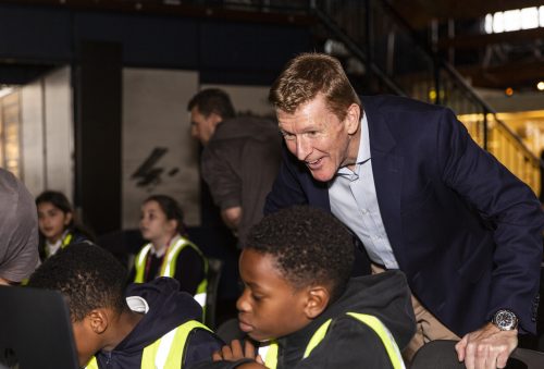 Tim Peake observes two boys writing code that will run in space as part of the European Astro Pi Challenge
