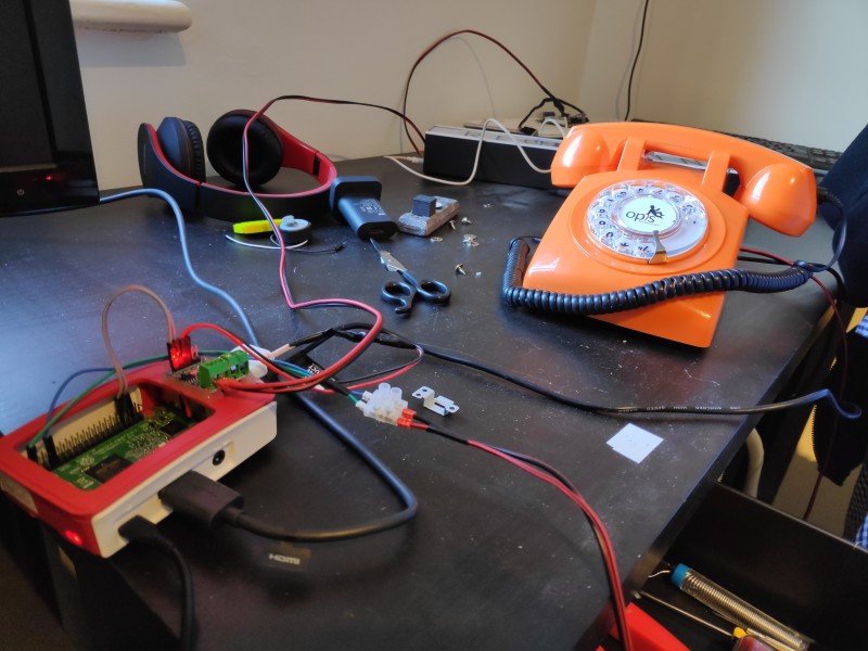 Testing a phone for use in the Rotary Dial Phone Project. Power constraints mean the phone's bell and the recording sign have to be disconnected when the Raspberry Pi that controls them boots up