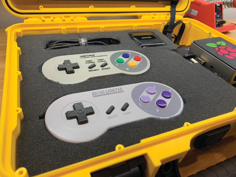 The Console Edition is essentially a Raspberry Pi with RetroPie installed connected to a display in a case with foam inserts for controllers and accessories