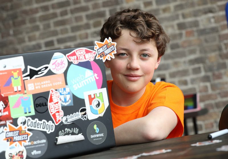 A young person at a laptop