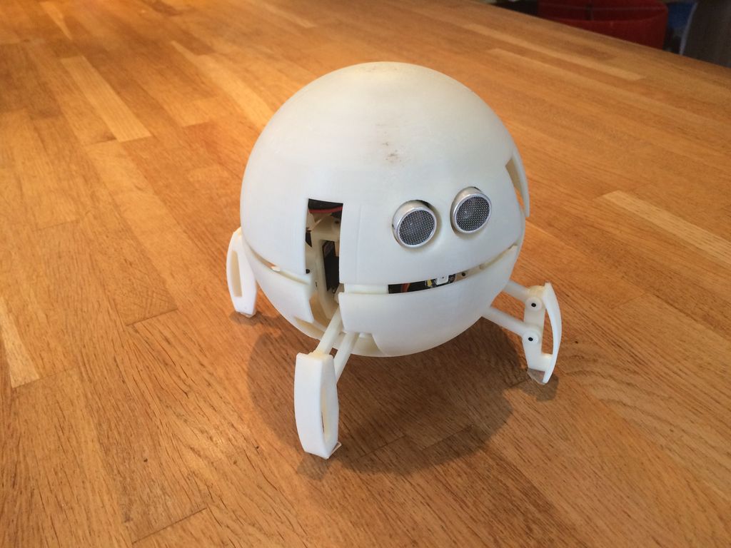 This robot looks like a ball and transforms itself into a quadruped to move