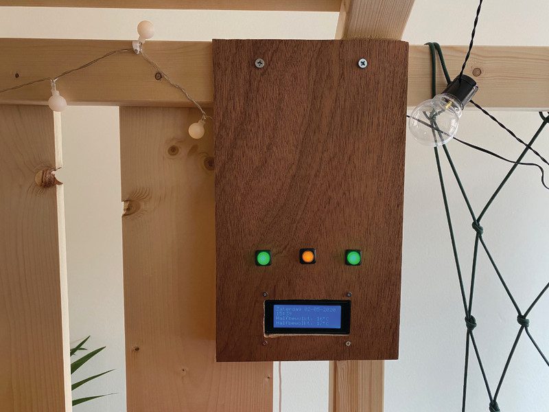 The control box uses a simple LCD display for weather and time