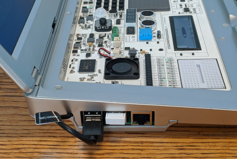 Raspberry Pi 4 with 4GB RAM is tucked into the side of the case; an access panel underneath enables you to get to the computer