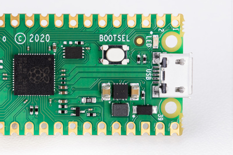 Hold Raspberry Pi Pico's BOOTSEL button while connecting power to put Pico into boot mode