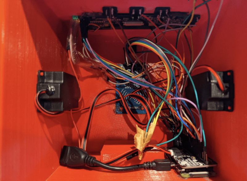 Interior of the RFID Gro Clock, showing Raspberry Pi Zero W and lighting all wired up