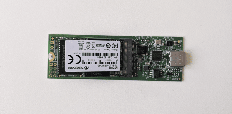The M.2 SSD adapter translates the SATA III interface on the M.2 SSD drive into a USB-C connection. This is used with a USB-C to USB-A cable to connect the drive to the blue USB 3.0 connection on Raspberry Pi 400