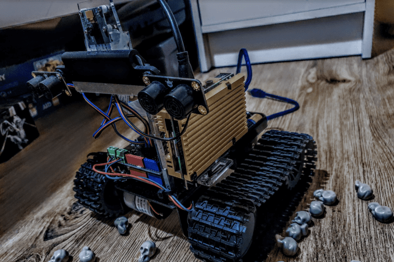 Fitted with a gold heatsink, a Raspberry Pi 4 is the robot’s brain, while an Arduino handles low-level functions
