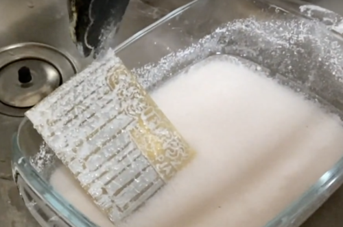 piano board sat in bowl in white liquid