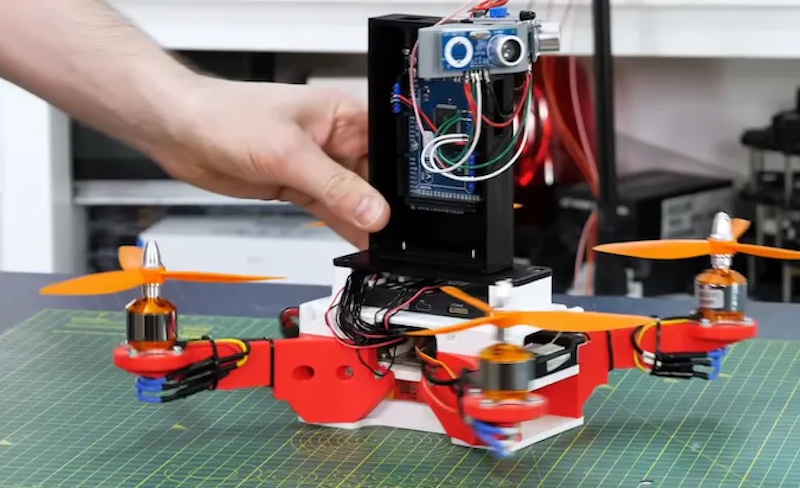 An experimental low-cost ultrasonic drone positioning system
