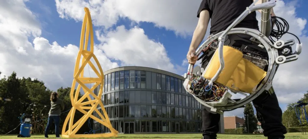 This machine automatically fabricates inflatable truss structures