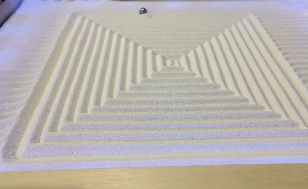 Transform your coffee table into a piece of kinetic sand art