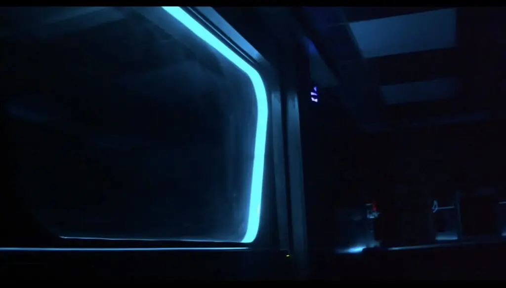 A pair of Arduino UNO R4 boards power this Tron-inspired, decked-out shop room